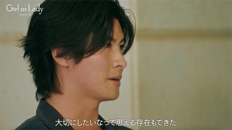 真剣な表情をした男性の横顔が映し出されています。画面下には「大切にしたいなって思える存在もできた」という字幕が表示されており、物語の重要な局面を示唆しています。